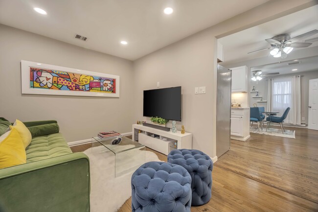 living room and view of dining room - 306 Church St