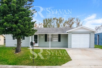 Building Photo - 6442 Reno Ave