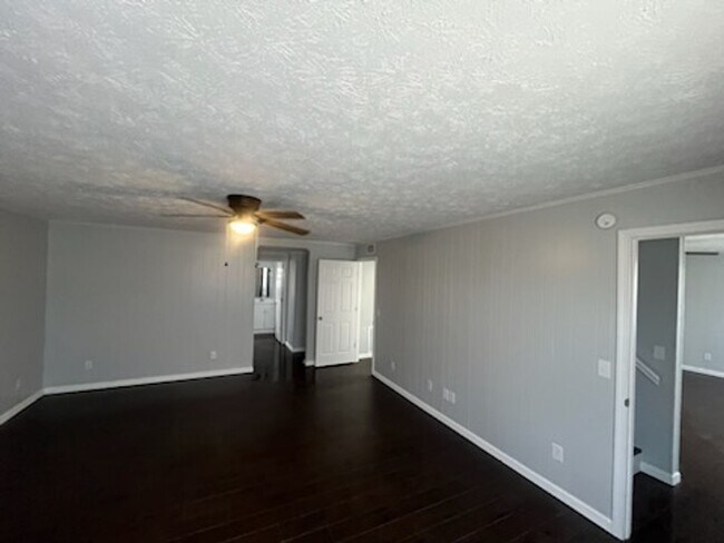 Building Photo - Unbeatable 5-Bed Townhome – Finished Basement & More!