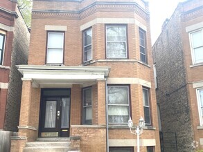 Building Photo - 7033 S Emerald Ave