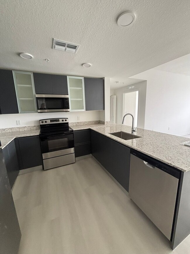 Building Photo - Beautiful and Brand New Apart in Millenia Park Orlando
