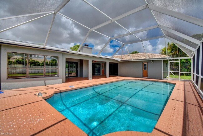 Foto del edificio - 4 br, 2.5 bath House - 637 NW 100th Ln