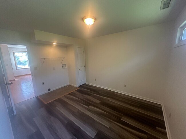 Building Photo - Small Single Family Home With Attached Garage