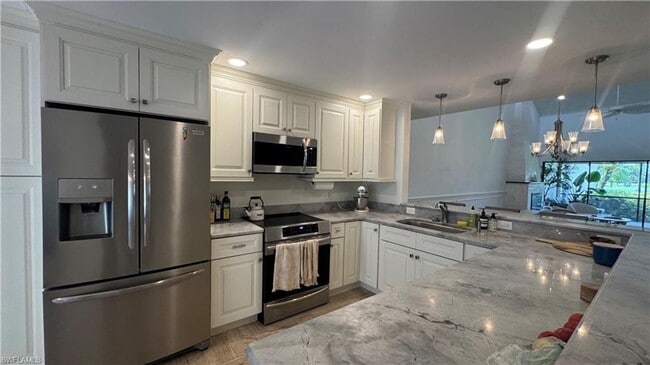 Building Photo - Available May 1st – Luxury Golf Villa in Lely! Walk to Pool, Minutes to Beaches & US Open Pickleb...