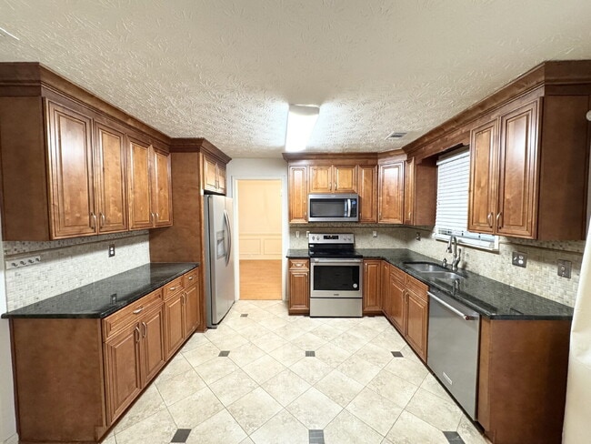 Foto del edificio - Rare Sugar Hill Rental with Huge Fenced Yard and Outdoor Living Space