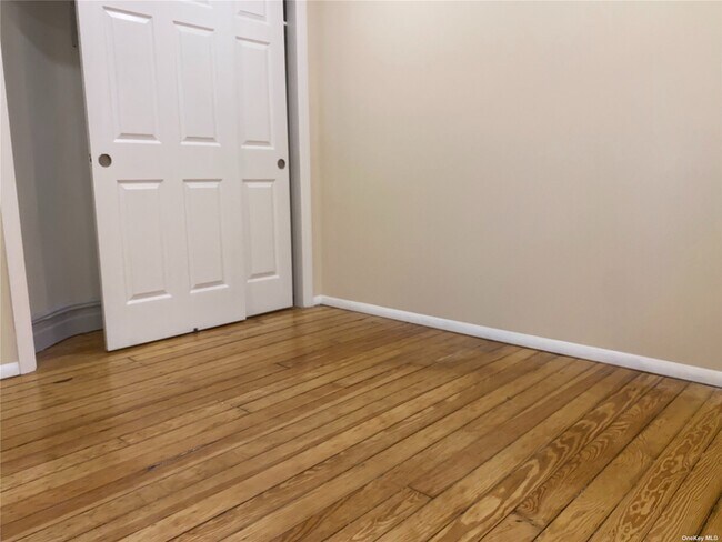 Building Photo - 62-24 60th Dr