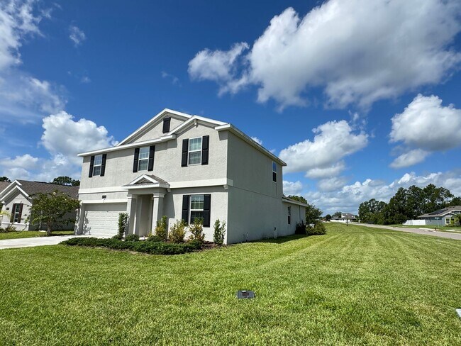 Building Photo - Elegant & Spacious 4-Bedroom Home with Bon...