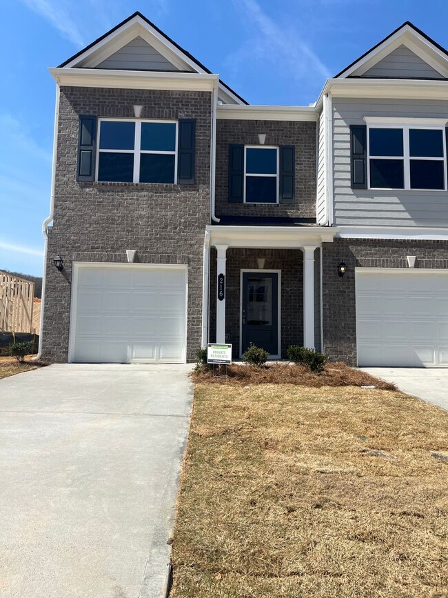 Building Photo - Beautiful Newly Constructed 3/.25 Townhome!