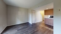 Located at 6417 Statute St in Chesterfield, VA, this two-floor home offers a well-designed layout with a blend of practical features and comfortable living spaces throughout. The main level showcases durable hardwood-style flooring that flows through the open living area, which benefits from natural light and includes a sliding glass door that opens directly to a fenced backyard — ideal for outdoor enjoyment. A closet with louvered doors adds convenient storage on this level, while a staircase leads to the upper floor. The kitchen is efficiently laid out and features granite-style countertops, warm wood cabinetry, a gas range, dishwasher, and a full-size black refrigerator, along with a window above the sink that brings in natural light. A dedicated laundry area houses a full-size top-load washer and dryer with overhead shelving for added storage. The bathroom is clean and functional, complete with a tub-shower combo, vanity, and wood-style tile flooring. Upstairs, the carpeted bedroom provides a quiet retreat, equipped with a ceiling fan with light fixture for year-round comfort. Neutral tones throughout the home create a versatile backdrop suitable for a variety of interior styles.