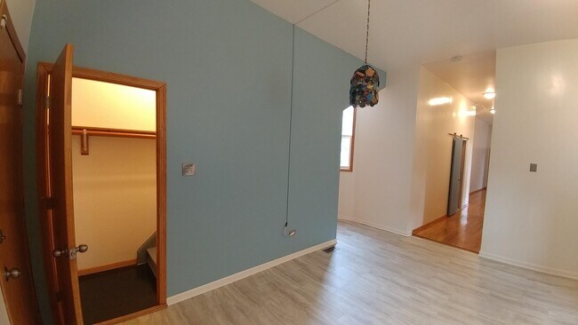 Other side of kitchen with pantry and view of hallway. - 6536 S Maryland Ave