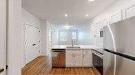 This 600 square foot apartment in Indianapolis, IN, offers a compact yet well-designed living space. The single-story layout includes one bedroom, one bathroom, a living room, kitchen, and closet. The primary bedroom, measuring 150 square feet, provides ample space and features carpeted flooring and a ceiling fan for comfort.

The interior showcases a harmonious blend of flooring types, with warm hardwood in the main living areas and plush carpeting in the bedroom. The living room is illuminated by natural light from a window, creating an inviting atmosphere. The modern kitchen boasts white cabinetry, stainless steel appliances, and a convenient breakfast bar, all complemented by the continuity of hardwood flooring.

The bathroom is efficiently designed with a single vanity, toilet, and bathtub/shower combination. It features the same hardwood flooring as the kitchen, maintaining a cohesive look throughout the apartment. A walk-in closet with wire shelving offers practical storage solutions.

Throughout the space, crisp white walls and recessed lighting contribute to a bright, airy feel. The apartment's layout maximizes the use of its 600 square feet, creating a comfortable and functional living environment. Located at 6214 Long Channel Ln, this apartment combines modern amenities with a prime Indianapolis location.