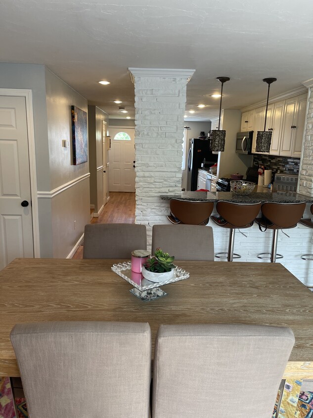 Dining room with access to hallway and door to the finished basement - 55 Colonel Bell Dr