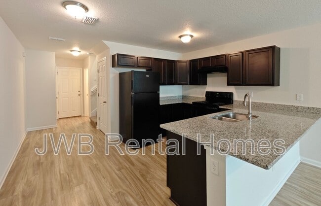 Building Photo - 8498 McGirts Village Ln