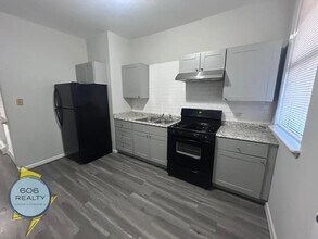 Building Photo - 5852 S Martin Luther King Dr