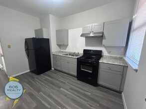 Building Photo - 5852 S Martin Luther King Dr