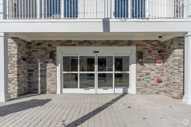 Entrance - Theta Grove, a Luxurious 55+ Rental Community