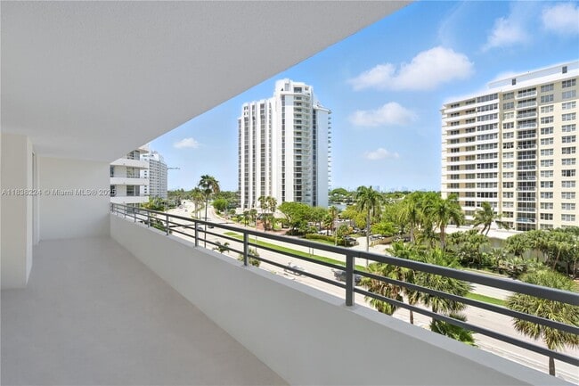 Building Photo - 5555 Collins Ave