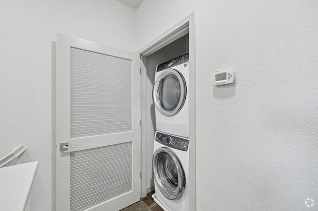 2BR, 2.5BA 1,317SF - Laundry Closet - Campus Oaks Apartments