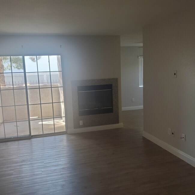 Living Room w/Fireplace - 6500 W Lake Mead Blvd