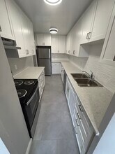 Building Photo - 1061 Queen's Blvd