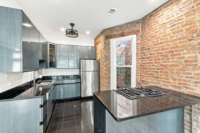 Foto del edificio - 3619 S Giles Ave