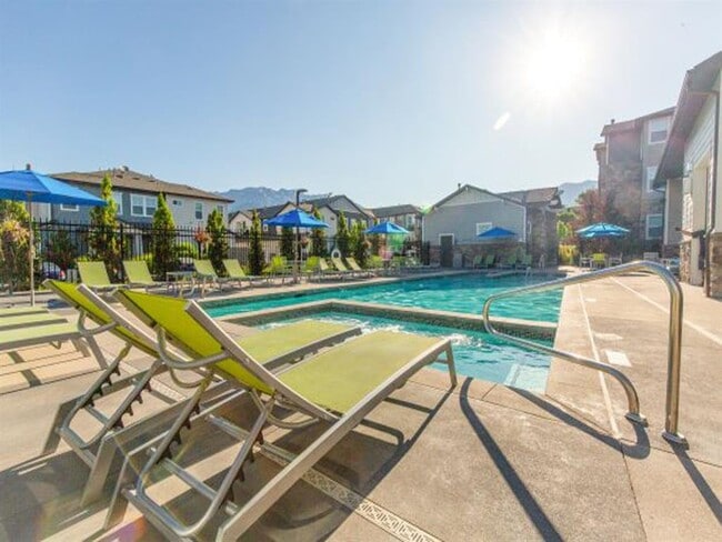 Relaxing Swimming Pool With Sundeck - Parc on Center Apartments & Townhomes