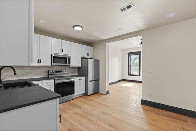 Building Photo - For Rent: Renovated 2-Story Townhouse in M...