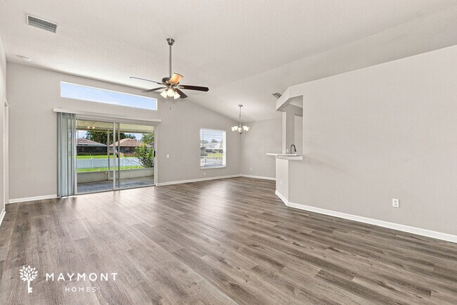 Building Photo - Spacious Riverview Home with Covered Patio