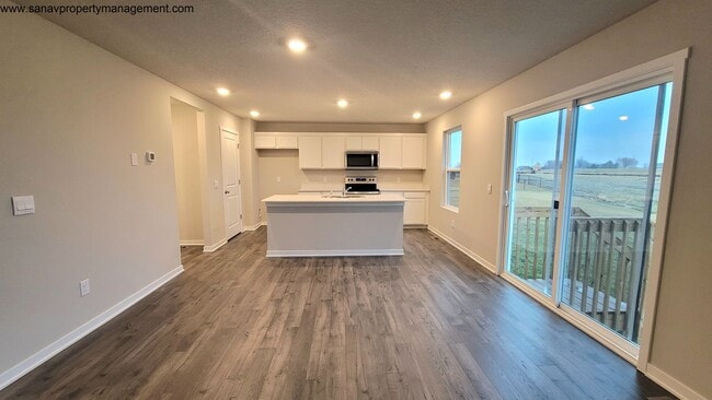 Building Photo - Contemporary Comfort: A Four-Bedroom Haven with Modern Flourish w/ 3 CAR GARAGE