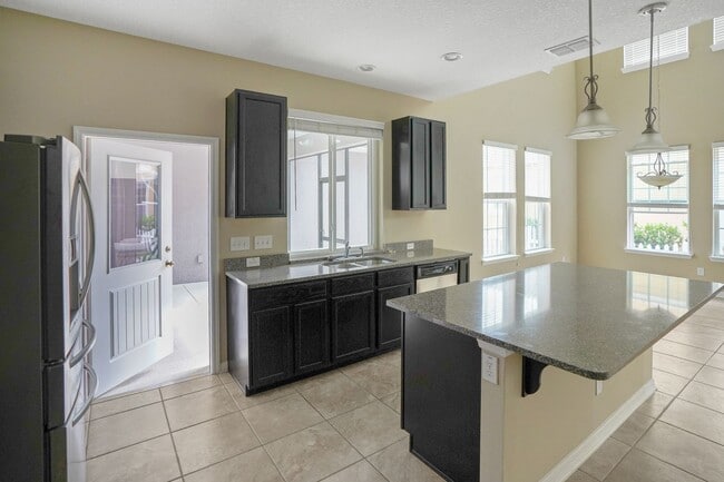 Photo - Spacious 4BR in Harmony w/ 2 Primary Suites House