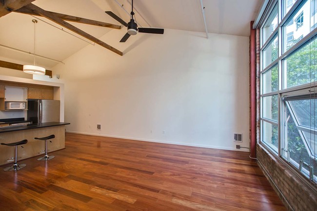 Building Photo - Top-Floor Brick and Timber Loft