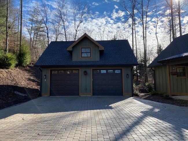 Two car garage with storage above. - 18 Twisted Birch Dr
