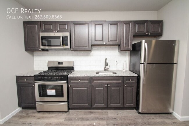 Building Photo - Three Bed Kingsessing Townhome