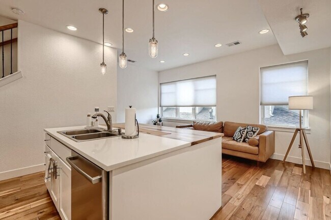 Building Photo - FIRST MONTH OFF - 3BR Townhome in trendy R...