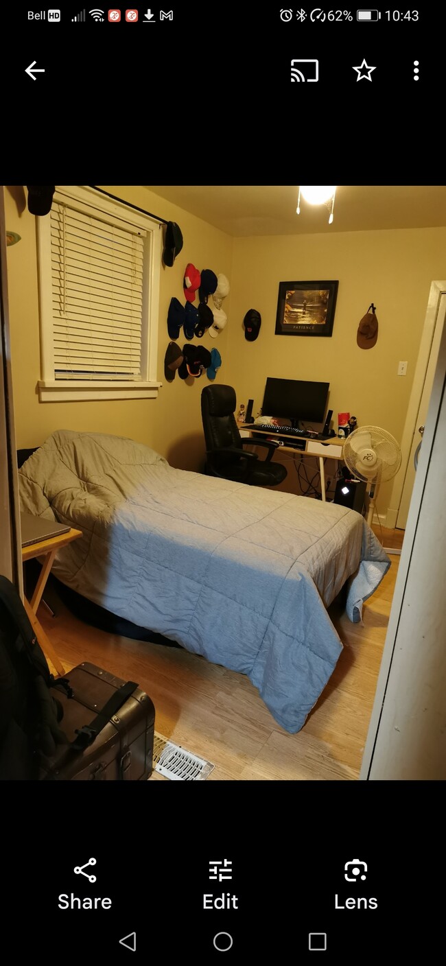 Bedroom with enough space for bed, desk and other furniture. Lockable door for privacy. - 143 Ontario St