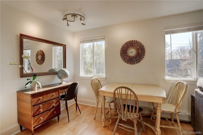 Building Photo - LOCATION LOCATION!! Open and spacious corner unit that offers abundant natural light and is conve...