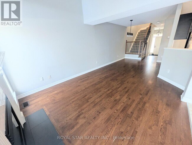 Building Photo - 210 Talltree Crescent