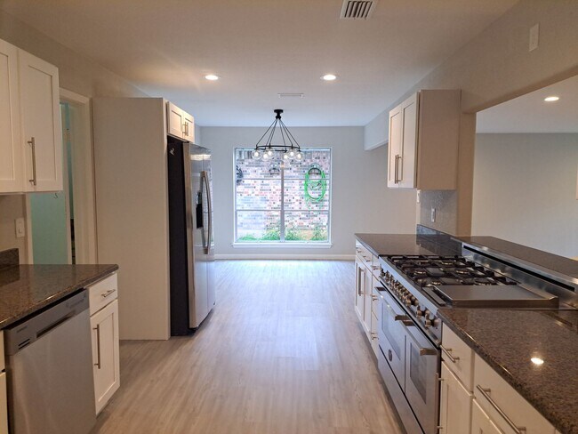 Photo - Updated 4 Bedroom / 2 Bath / 2 Car Garage House