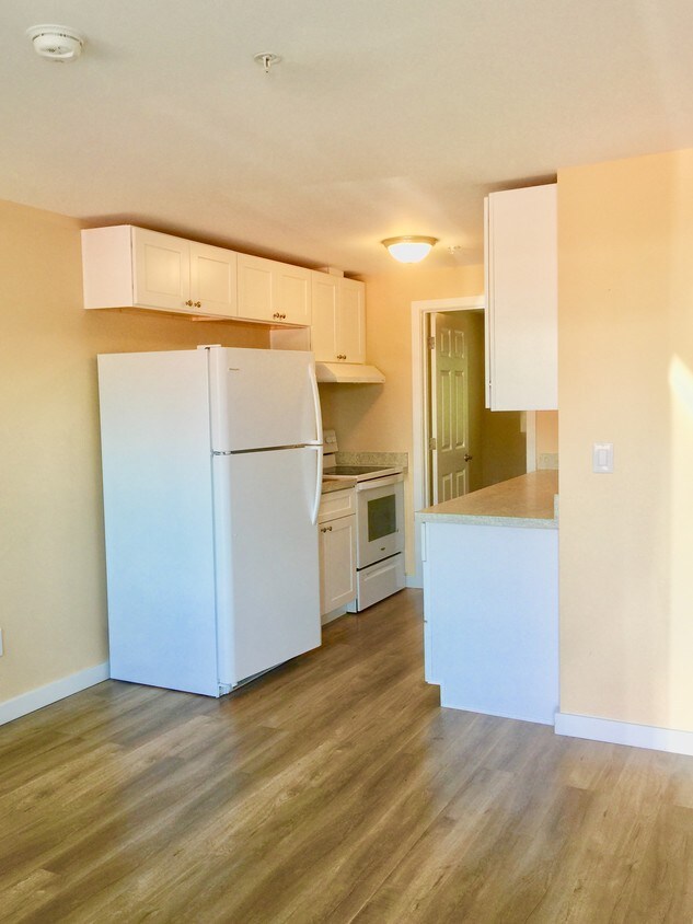 modern wood floor design - 5124 Seattle Ave SW