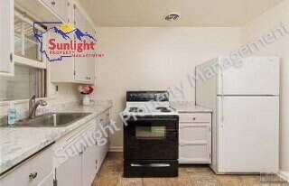 Foto del edificio - "Charming 2-Bed Home with Gleaming Hardwood Floors in Billings, MT!"