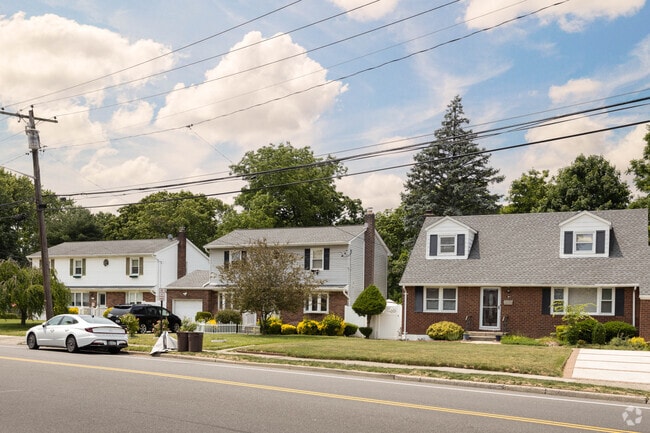 Rows of tow-story homes line the streets of Farmingdale in New York.