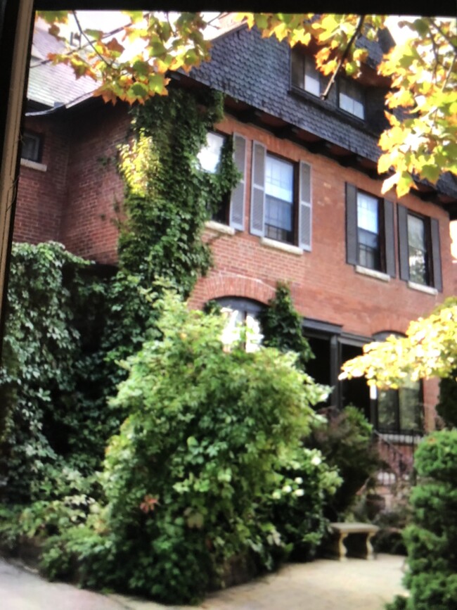 Exterior of the house with the front garden - 664 Huron St