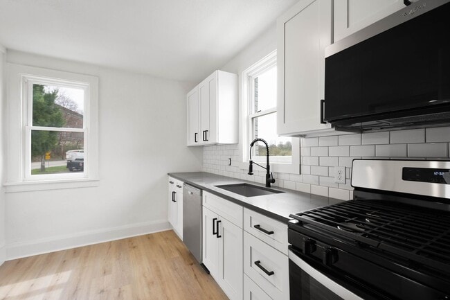 Building Photo - 2 BEDROOM END UNIT IN THE HEART OF DORMONT...