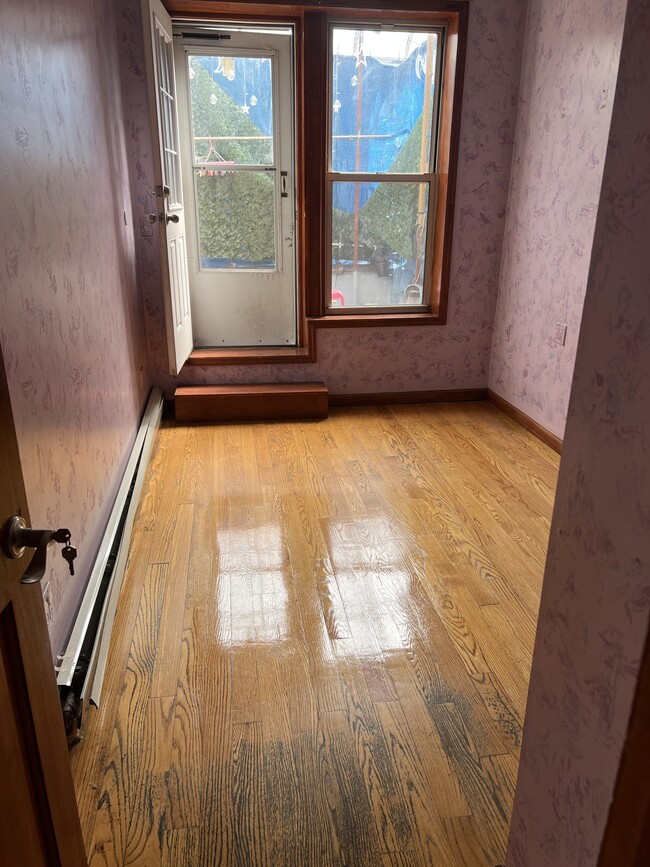 Beautiful wood floor bedroom - 4801 8th Ave