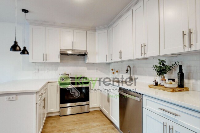 Foto del edificio - Modern New Construction 2 Bedroom Townhome with Garage & Driveway — First Occupancy!