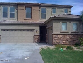 Building Photo - 3821 S 100th Ave