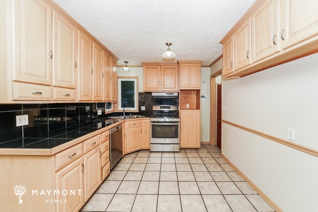 Building Photo - Charming 3-Bedroom Home with Finished Base...