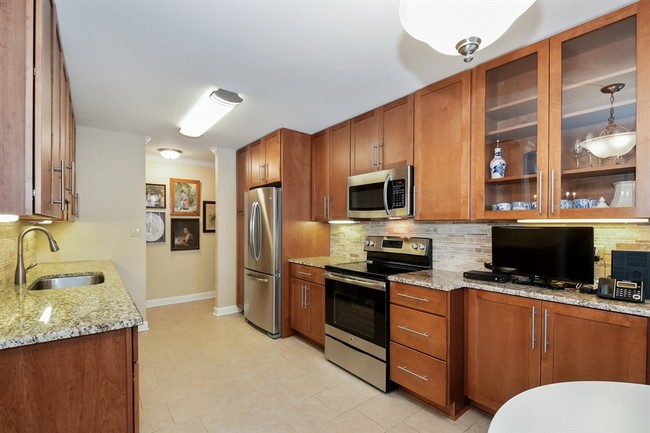 42" Cabinets Provide Plenty of Storage Space - Americana Apartments