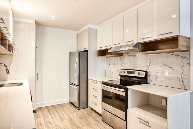 Building Photo - 9675 Av. Papineau