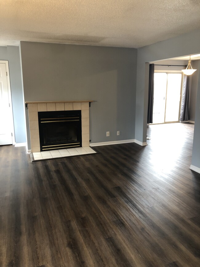 Living room with gas fireplace! - 1414 Garrison Rd